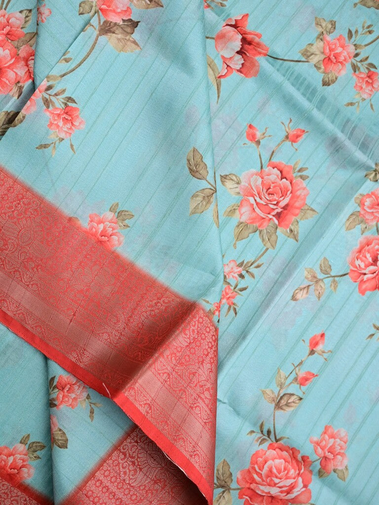 Tussar silk fancy saree light blue color allover prints & zari border with contrast pallu and attached printed blouse