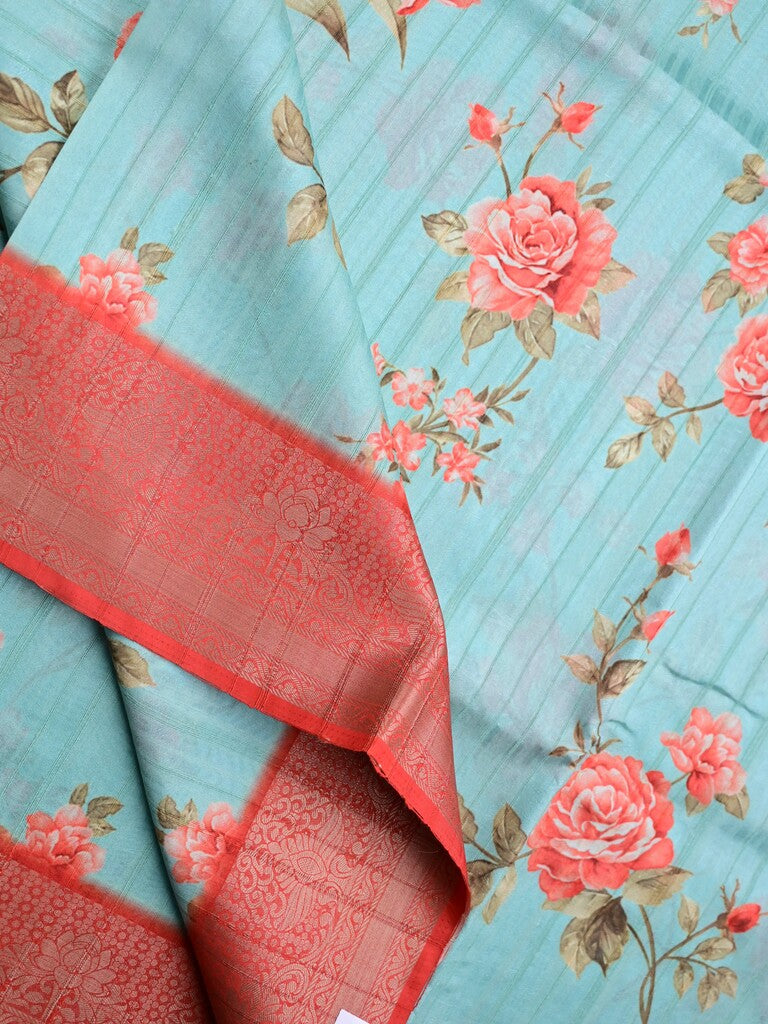 Tussar silk fancy saree light blue color allover prints & zari border with contrast pallu and attached printed blouse