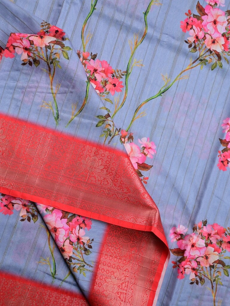 Tussar silk fancy saree light blue color allover prints & zari border with contrast pallu and attached printed blouse