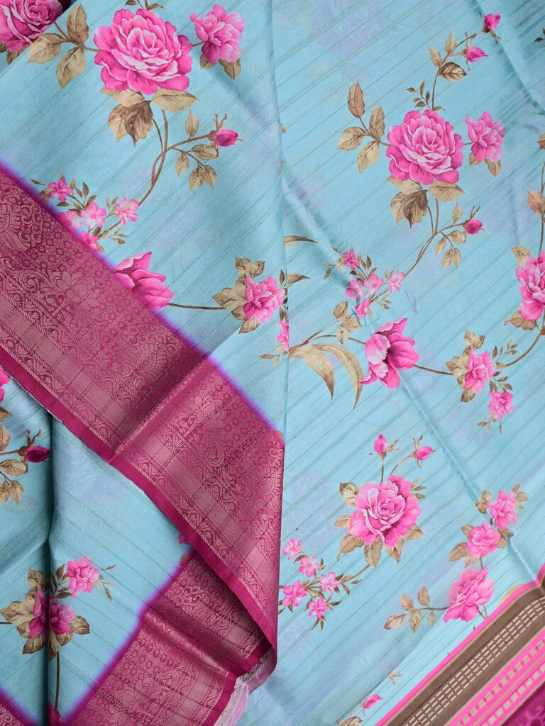 Tussar silk fancy saree light blue color allover prints & zari border with contrast pallu and attached printed blouse