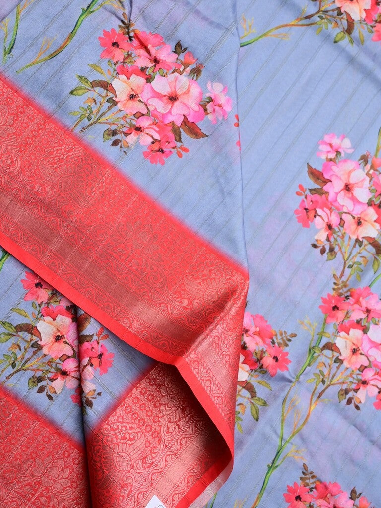 Tussar silk fancy saree light blue color allover prints & zari border with contrast pallu and attached printed blouse