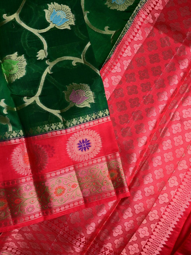 Akshara silk pattu saree bottle green color allover zari weaves & zari border with contrast brocade pallu and brocade blouse