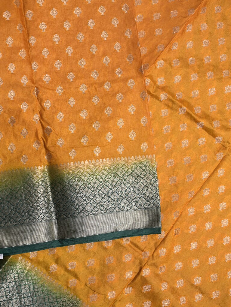 Dupion fancy saree mustard yellow color allover motifs & zari border with contrast pallu and attached blouse
