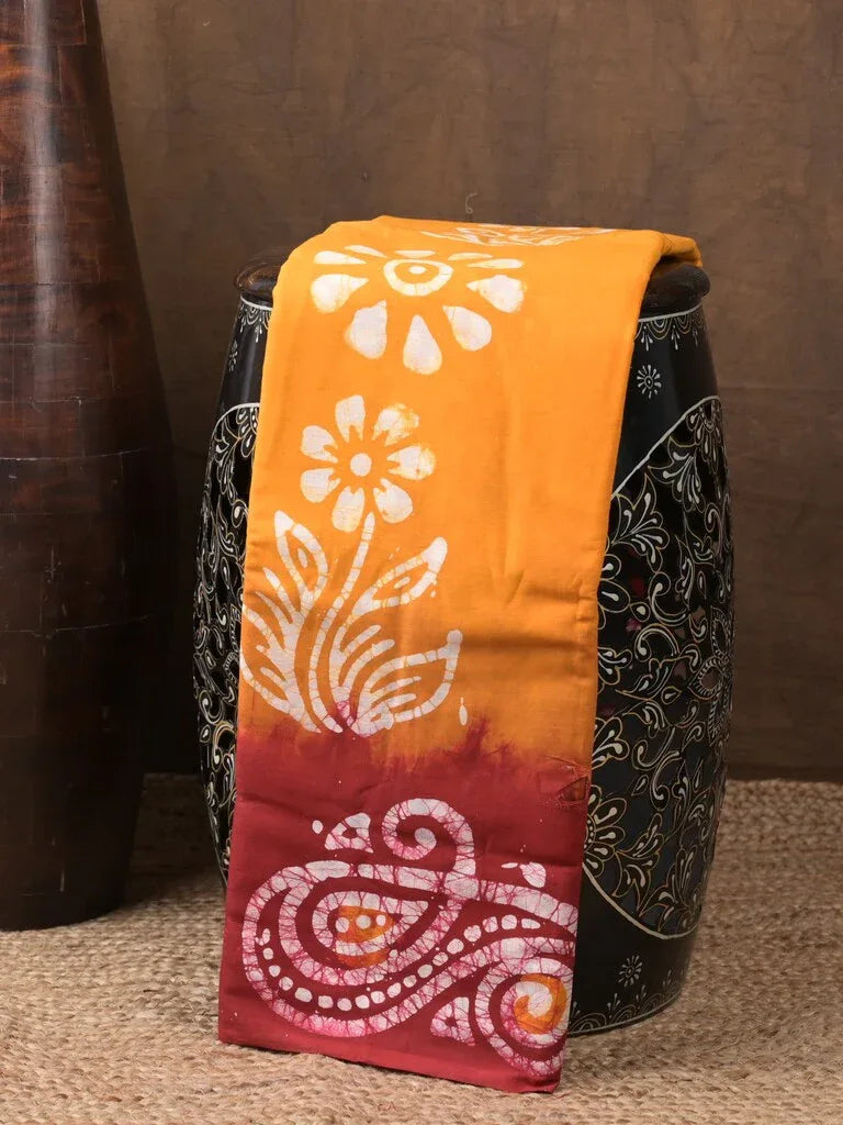 Maheswari cotton saree yellow color allover bathik prints & printed border with printed pallu and plain blouse