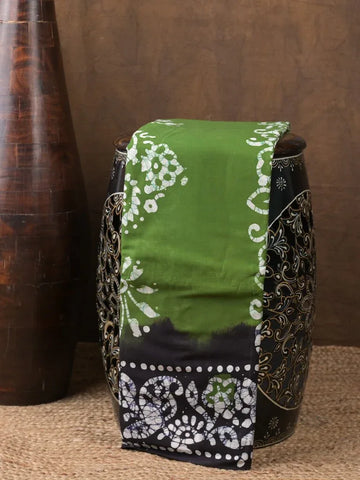Maheswari cotton saree green color allover bathik prints & printed border with printed pallu and plain blouse