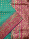 Banaras fancy saree lux green color allover zari motifs & zari border with contrast rich pallu and brocade blouse