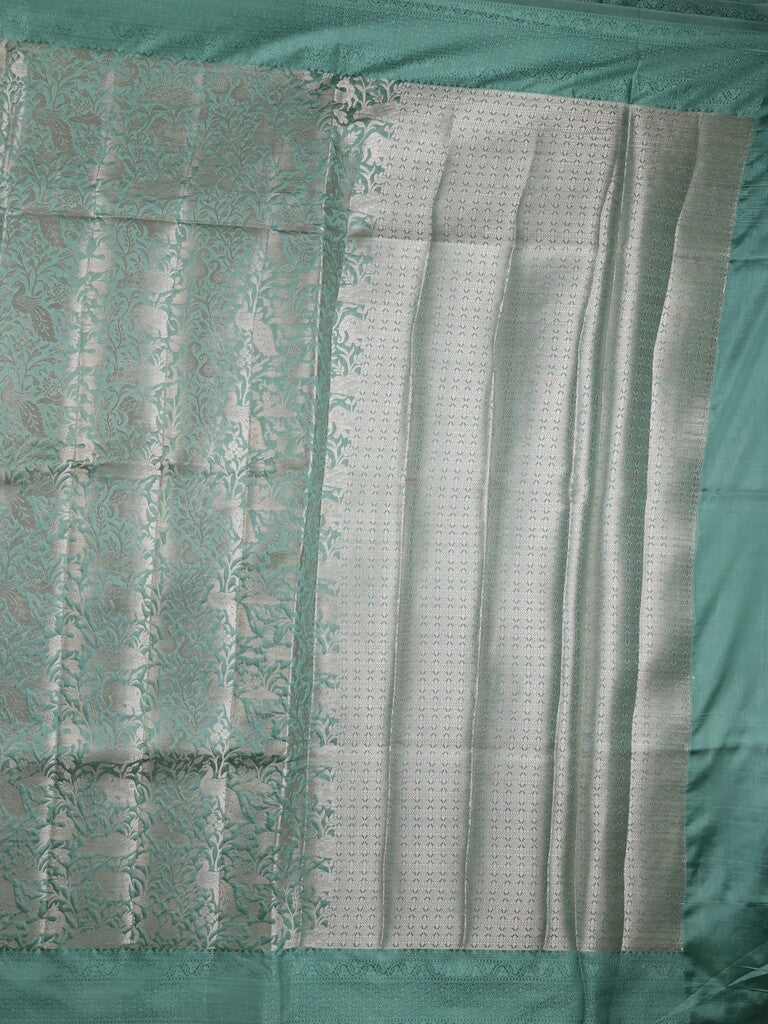 Banaras fancy saree lux green color allover zari weaves & kaddi border with brocade pallu and brocade blouse