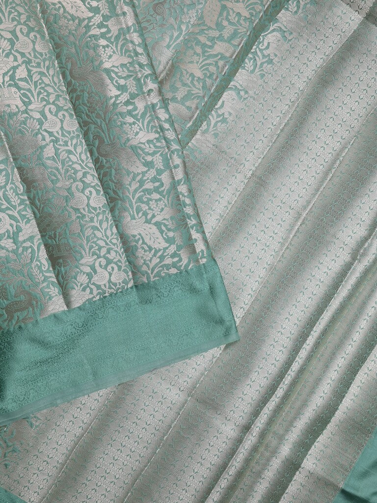 Banaras fancy saree lux green color allover zari weaves & kaddi border with brocade pallu and brocade blouse