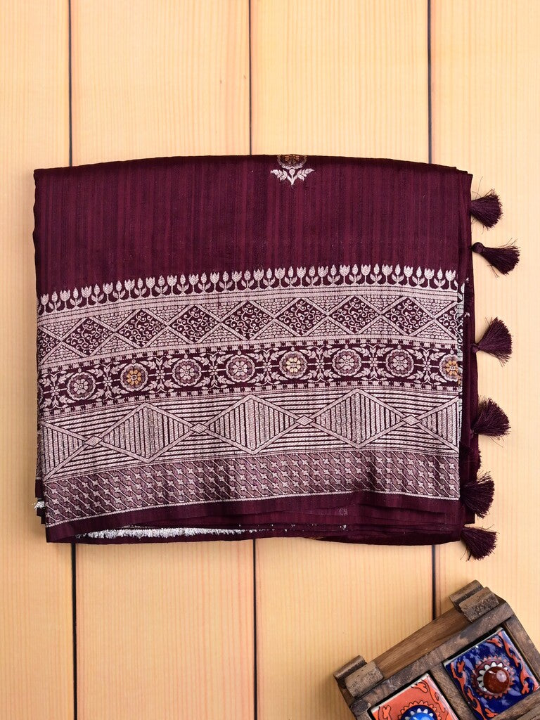 Jute fancy silk saree wine color allover zari motifs & zari border with zari weaving pallu and attached blouse