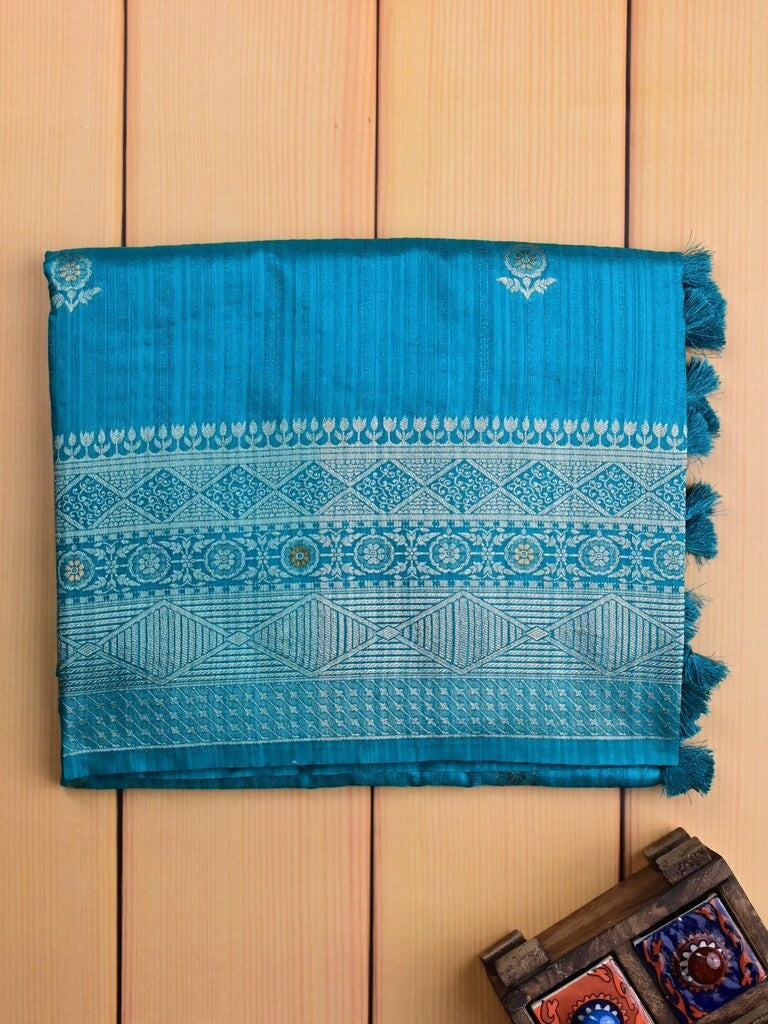 Jute fancy silk saree sky blue color allover zari motifs & zari border with zari weaving pallu and attached blouse