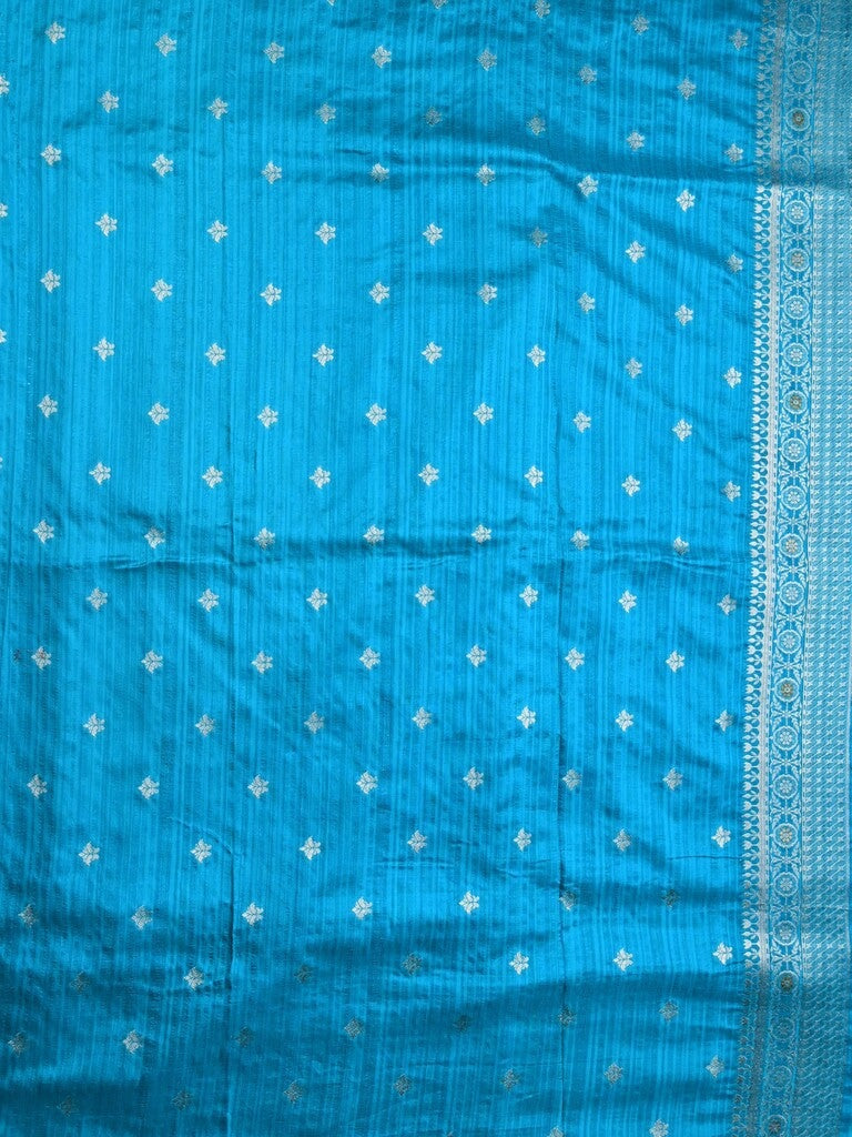 Jute fancy silk saree sky blue color allover zari motifs & zari border with zari weaving pallu and attached blouse