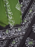Maheswari cotton saree green color allover bathik prints & printed border with printed pallu and plain blouse