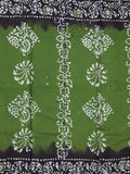 Maheswari cotton saree green color allover bathik prints & printed border with printed pallu and plain blouse