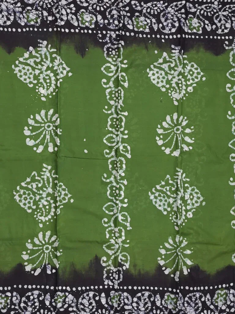 Maheswari cotton saree green color allover bathik prints & printed border with printed pallu and plain blouse