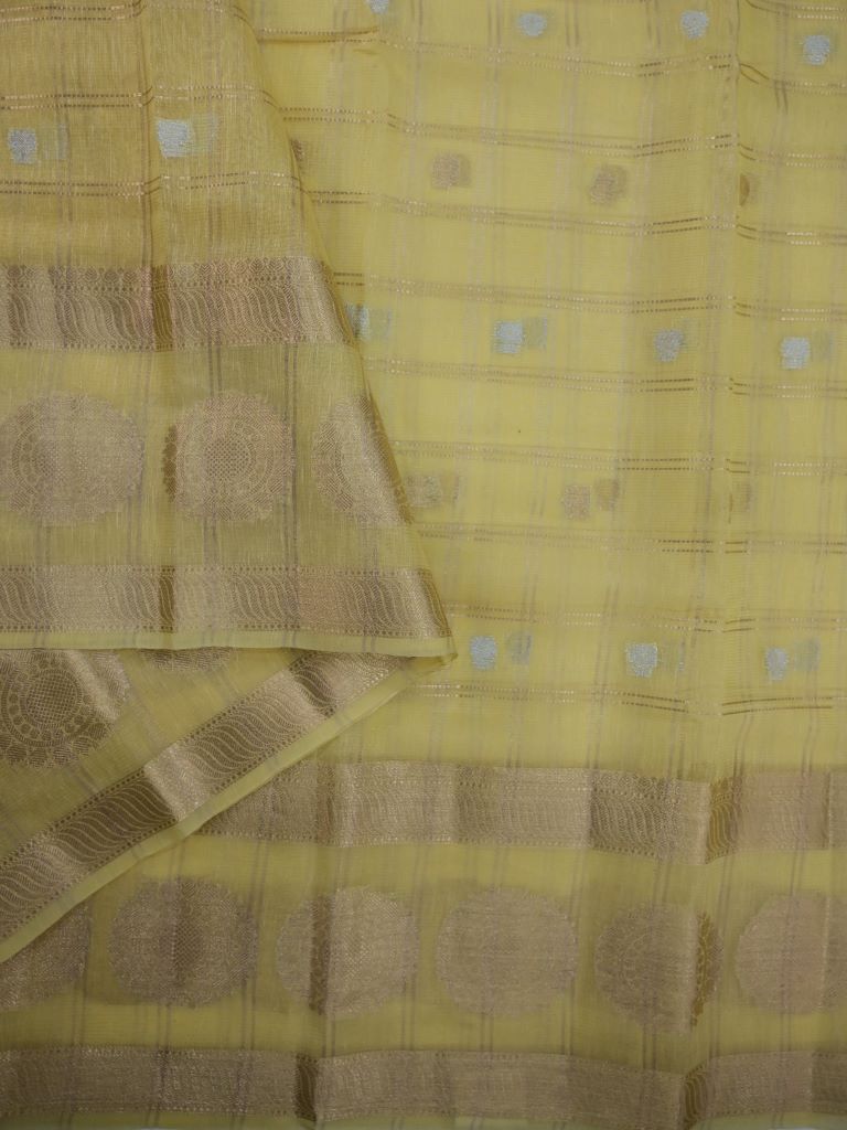 Kota tissue fancy saree light yellow color allover zari checks , motifs & zari border with short pallu and attached blouse