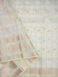 Kota tissue fancy saree cream color allover zari checks , motifs & zari border with short pallu and attached blouse