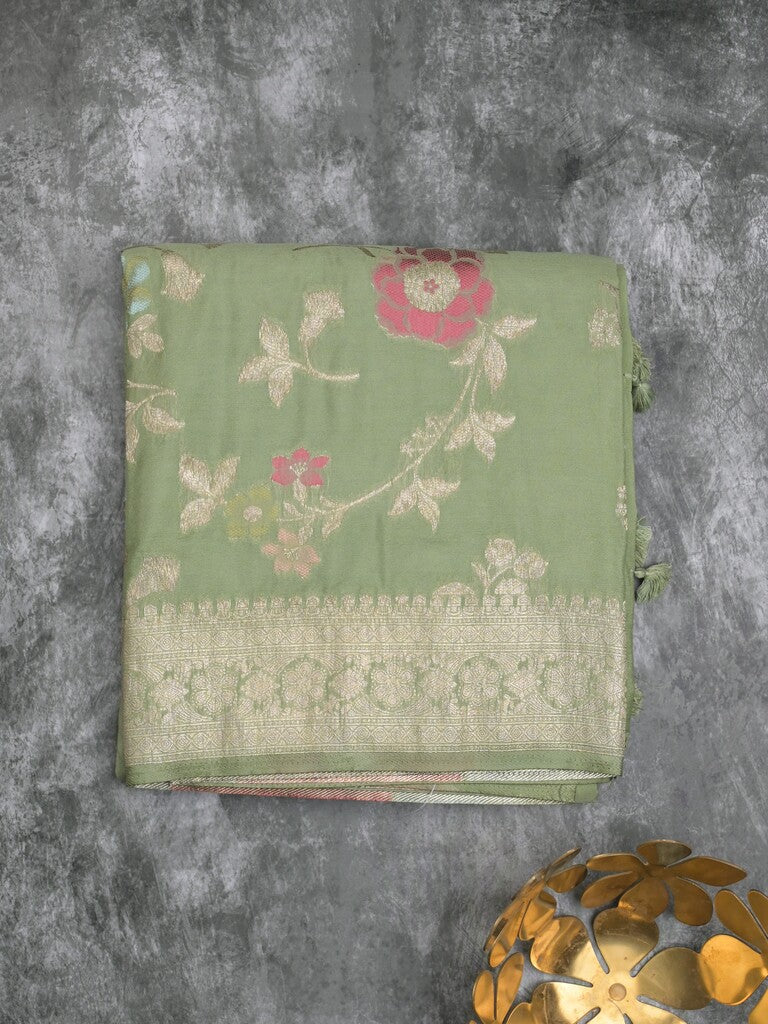 Georgette fancy saree pista green color allover zari weaves & zari border with rich pallu and plain self blouse