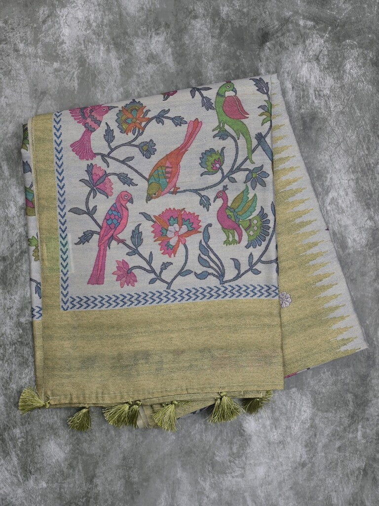 Tussar fancy saree snuff color allover motifs & printed border with running pallu and attached self blouse