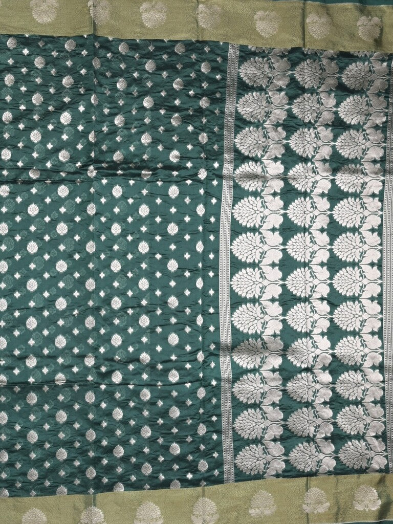 Chanderi kora fancy saree dark green color allover zari motifs & zari border with rich pallu and plain blouse
