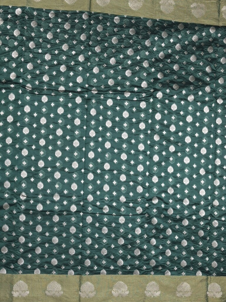 Chanderi kora fancy saree dark green color allover zari motifs & zari border with rich pallu and plain blouse
