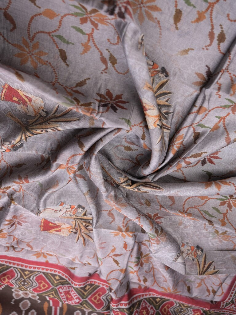 Tussar fancy saree light grey color allover prints & printed border with contrast pallu and attached printed blouse