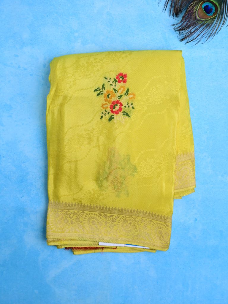 Dola tissue fancy saree lemon yellow color allover zari weaves & small border with rich pallu and contrast plain blouse