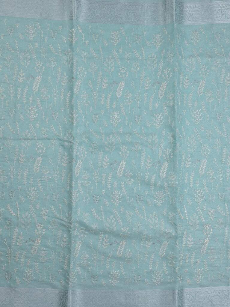 Jute tissue fancy saree sky blue color allover embroidery & zari border with short pallu and plain self blouse