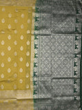 Dupion fancy saree greenish yellow color allover zari motifs & zari border with rich pallu and plain contrast blouse