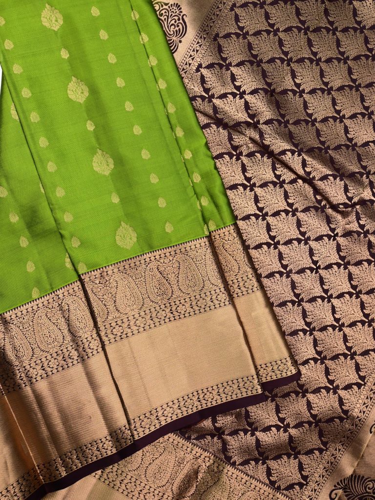 Kanchi pattu saree parrot green color allover zari motifs & zari border with rich pallu and contrast plain bouse