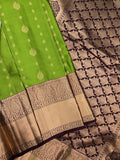 Kanchi pattu saree parrot green color allover zari motifs & zari border with rich pallu and contrast plain bouse