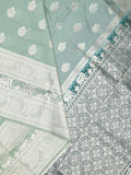 Dupion fancy saree lux green color allover zari motifs & zari border with rich pallu and plain contrast blouse