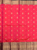 Kanchi pattu saree coral pink color allover zari motifs & zari border with rich pallu and contrast plain bouse