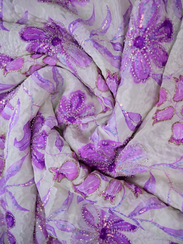 Crape silk fabric light lavender color allover prints & sequence work