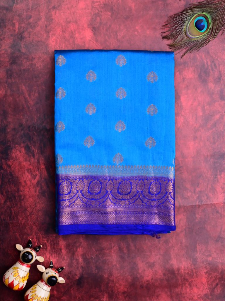 Munga pattu saree sky blue color allover zari motifs & zari border with short pallu and contrast brocade blouse