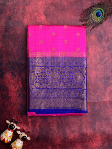 Munga pattu saree pink color allover zari checks and motifs & zari border with short pallu and contrast brocade blouse