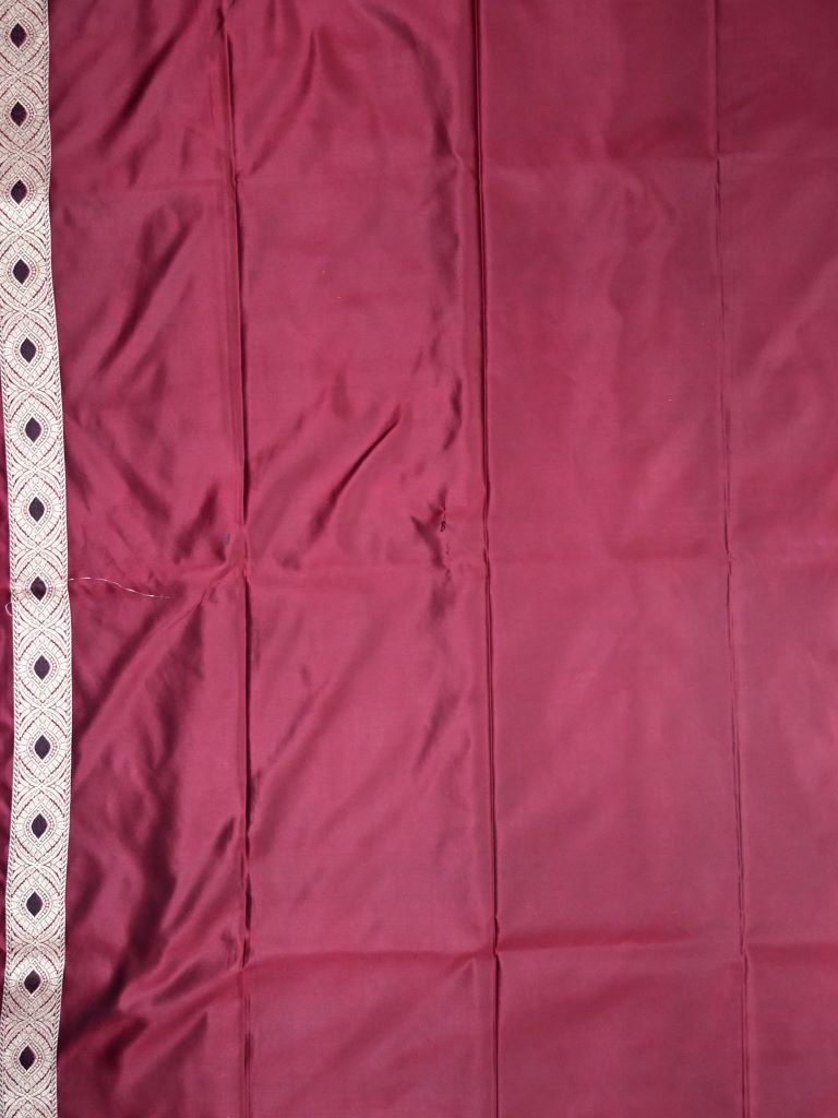 Banaras pattu saree wine color allover weaves & zari boder with rich pallu and attached plain blouse