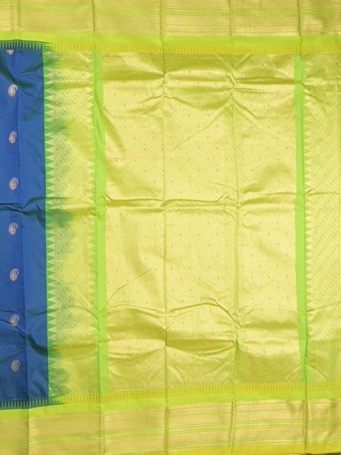 Gadwal pattu saree in royal blue color allover zari motifs & zari border with rich pallu and plain blouse