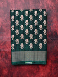 Fancy tussar saree green color with allover small flower motive prints, small zari kaddi border, short pallu and plain blouse