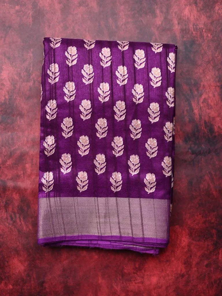 Fancy tussar saree purple color with allover small flower motive prints, small zari kaddi border, short pallu and plain blouse