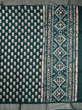 Fancy tussar saree green color with allover small flower motive prints, small zari kaddi border, short pallu and plain blouse