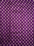 Fancy tussar saree purple color with allover small flower motive prints, small zari kaddi border, short pallu and plain blouse