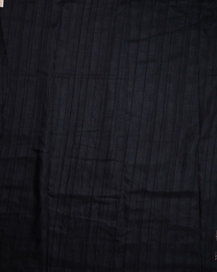 Fancy tussar saree black color with allover small flower motive prints, small zari kaddi border, short pallu and plain blouse