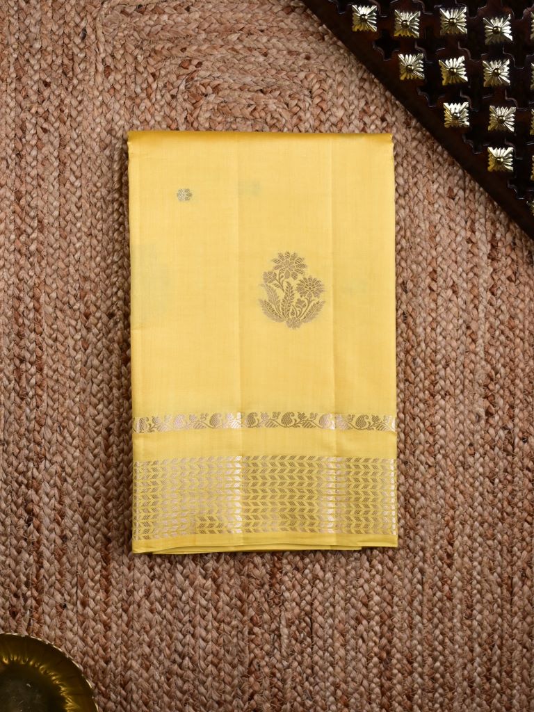 Raw mango pattu saree light yellow color allover zari motifs & zari border with short pallu and brocade blouse