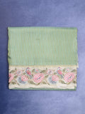 Dola tissue fancy saree lux green color allover stripes & designer fancy border with running pallu and embroidery blouse
