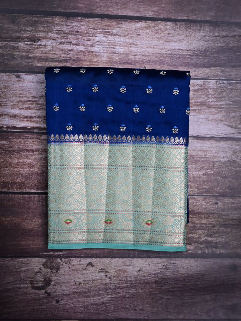 Munga pattu saree royal blue color allover zari motifs & zari border with brocade pallu and plain contrast blouse