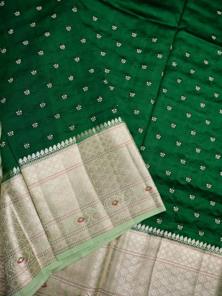 Munga pattu saree bottle green color allover zari motifs & zari border with brocade pallu and plain contrast blouse