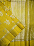 Raw mango pattu saree golden yellow color allover zari motifs & small kaddi border with short pallu and contrast blouse