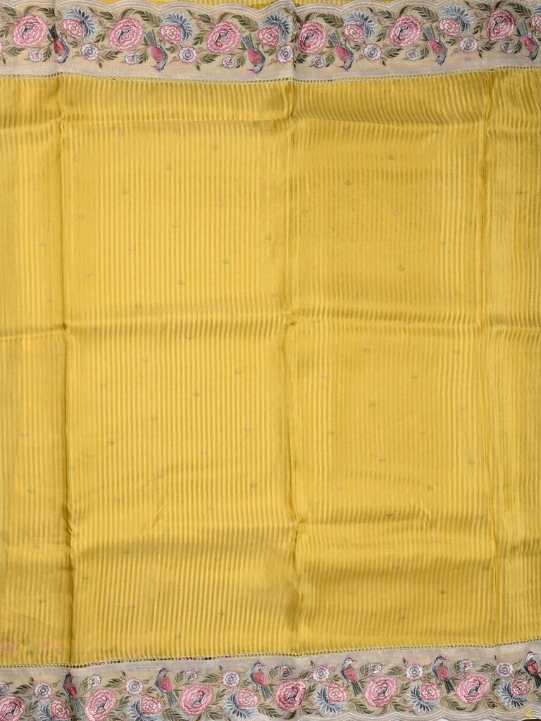 Dola tissue fancy saree yellow color allover stripes & designer fancy border with running pallu and embroidery blouse