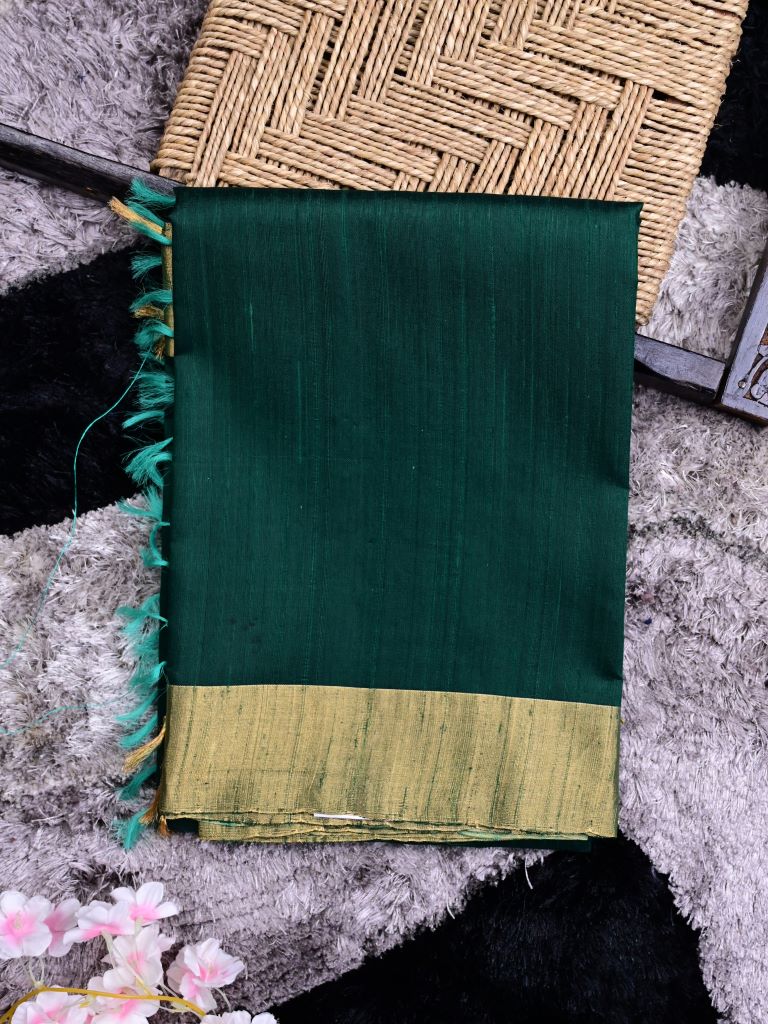 Raw silk pattu saree bottle green color allover plain & small zari border with contrast ikkath pallu and ikkath blouse