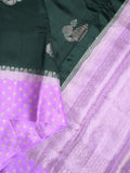 Chiniya pattu saree dark green color allover zari weaves & zari border with brocade pallu and attached contrast blouse